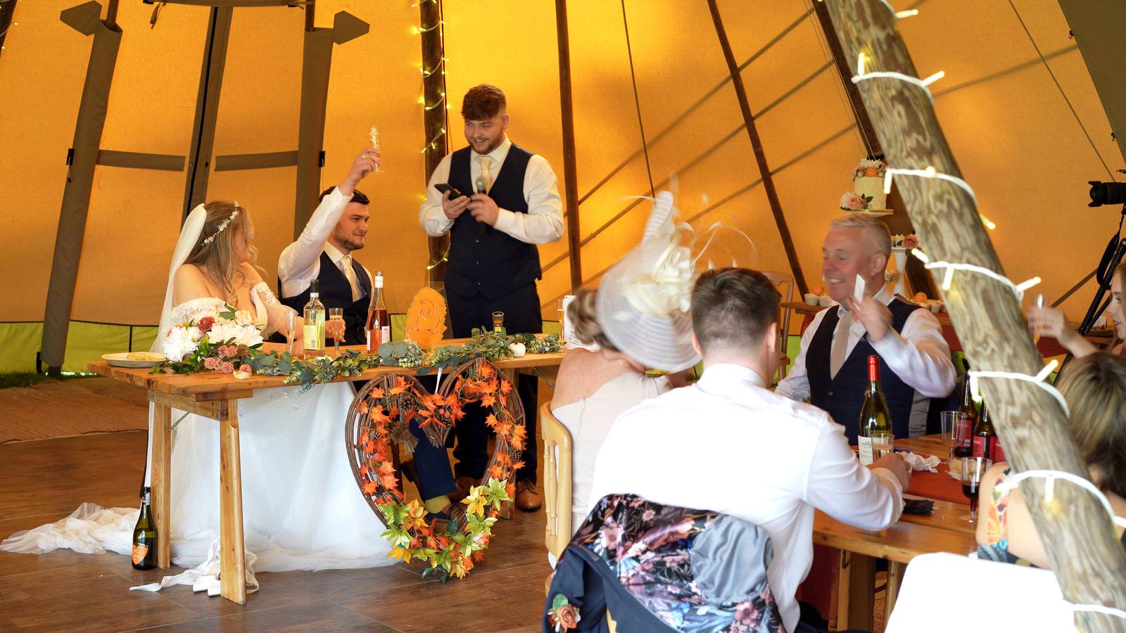 best man makes everyone laugh during wedding speeches