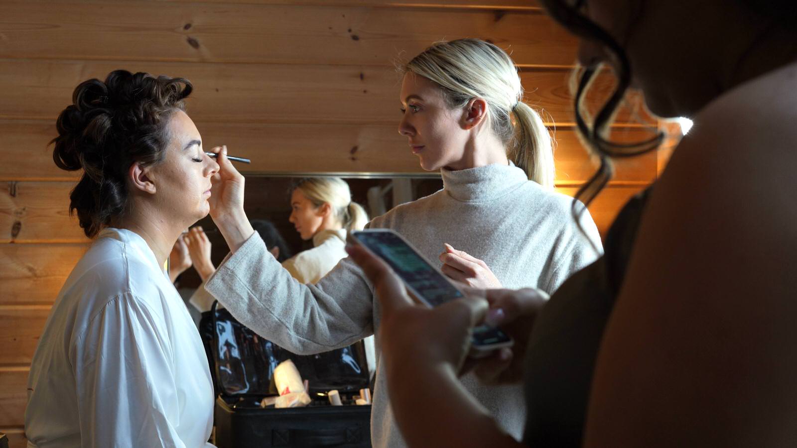 video still of bride having makeup done at Styal Lodge