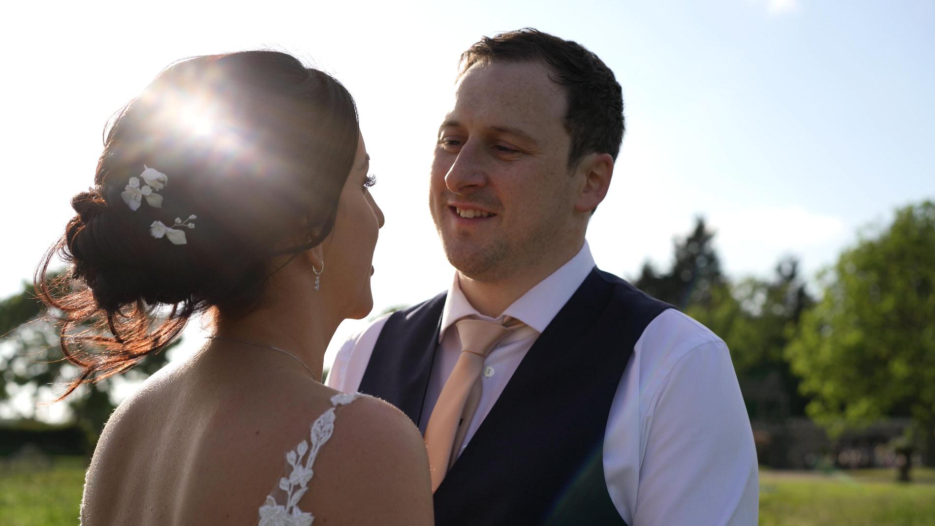 video still of couple posing in the golden hour