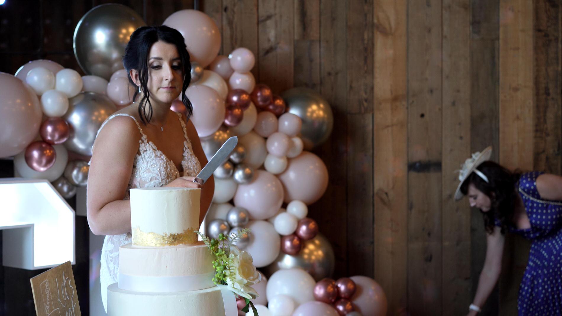 bride waits by the cake with no groom