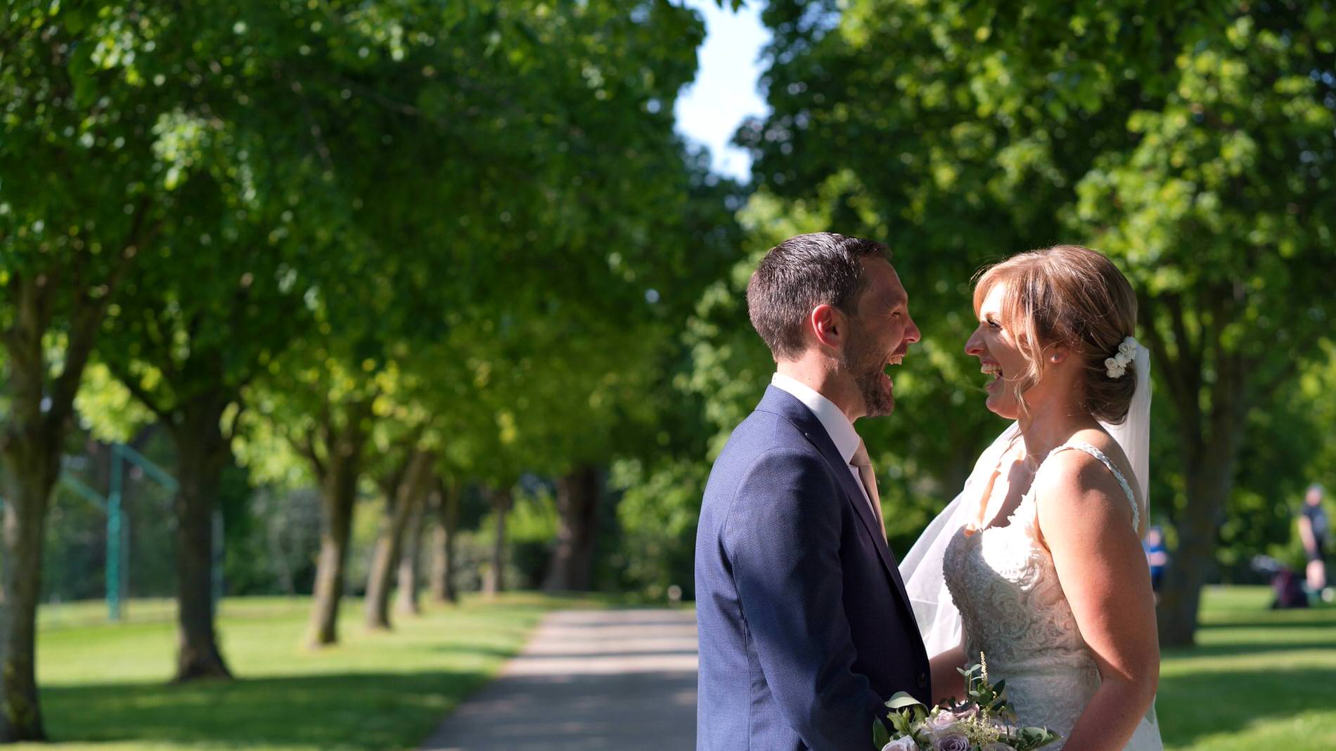 a bride and groom laugh during their Pryors Hayes Golf Club wedding