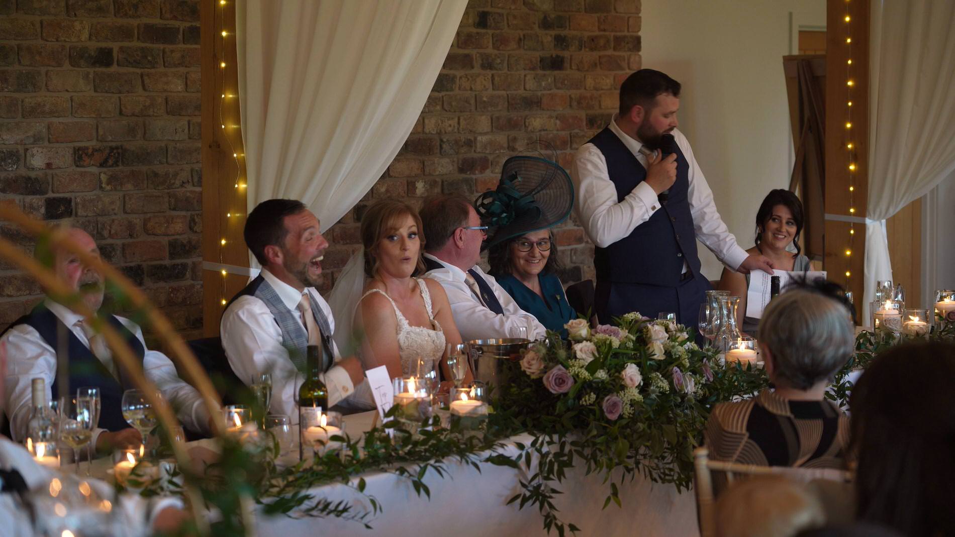 the best man has everyone laughing during his speech