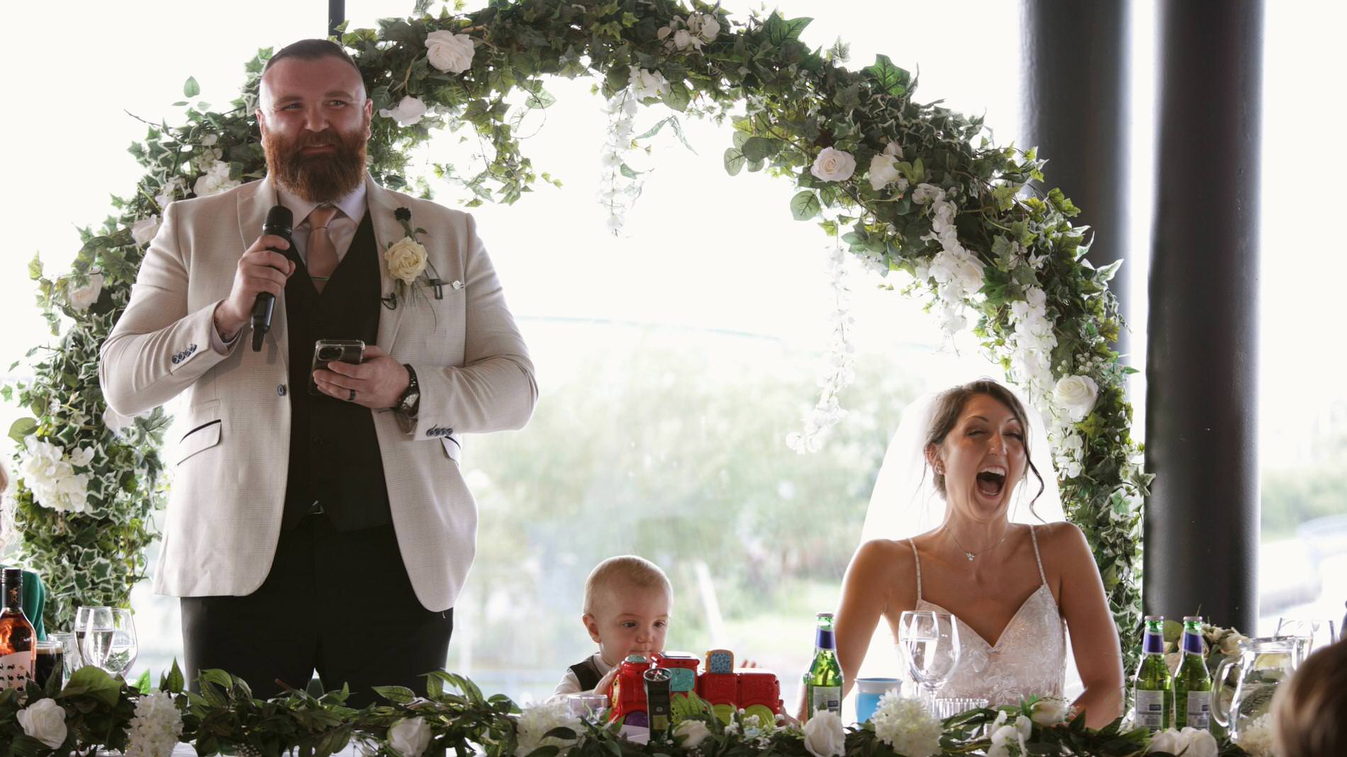 the videographer captures the grooms speech at The Waterfront Southport