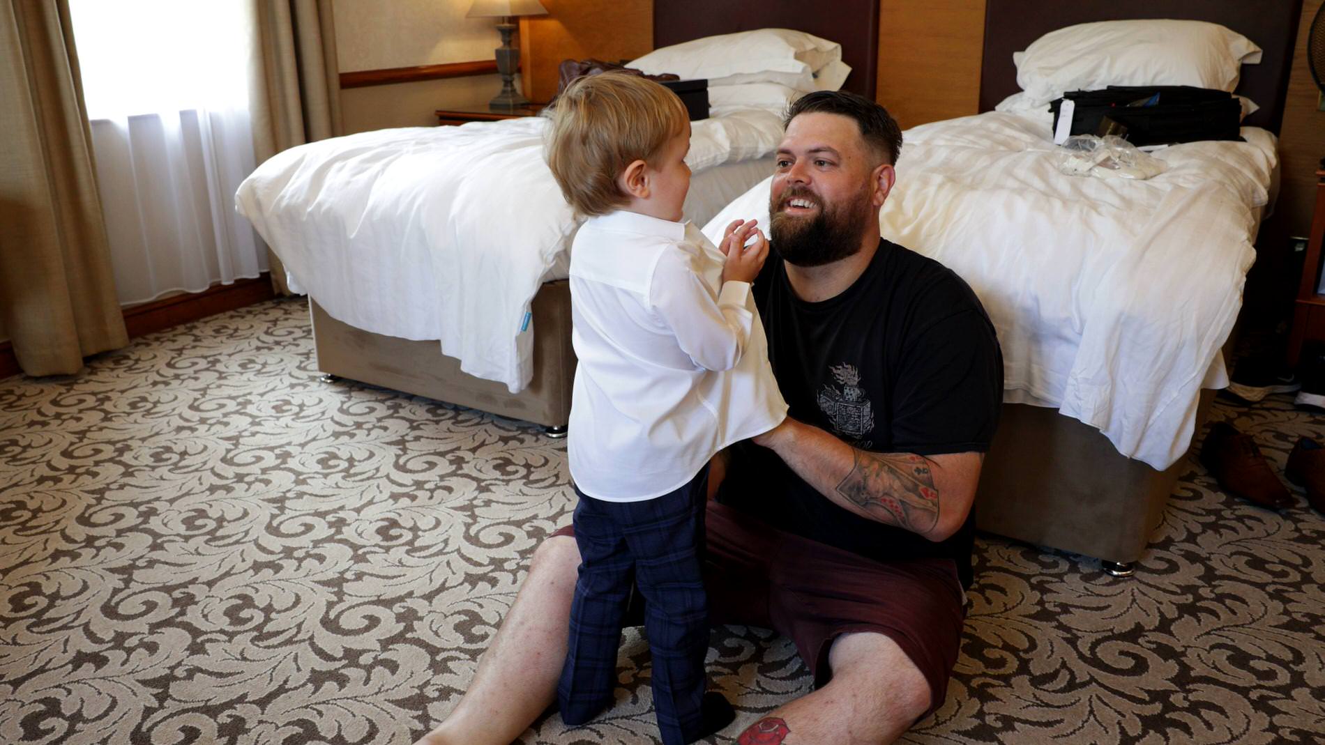 groom gets his son dressed at Nunsmere Hall