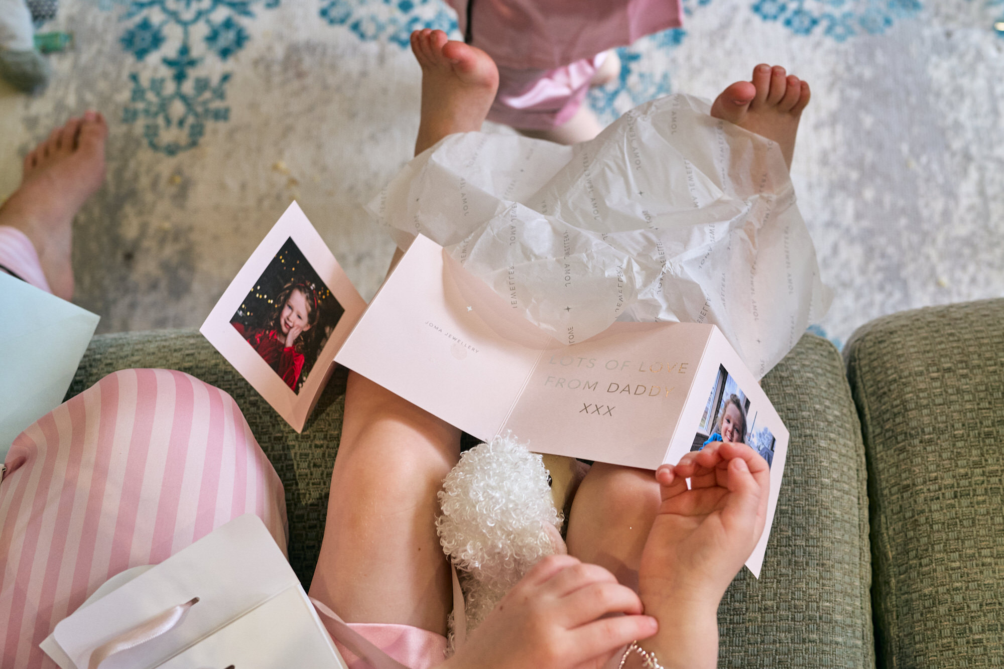 a close up of the personal wedding card to a flower girl