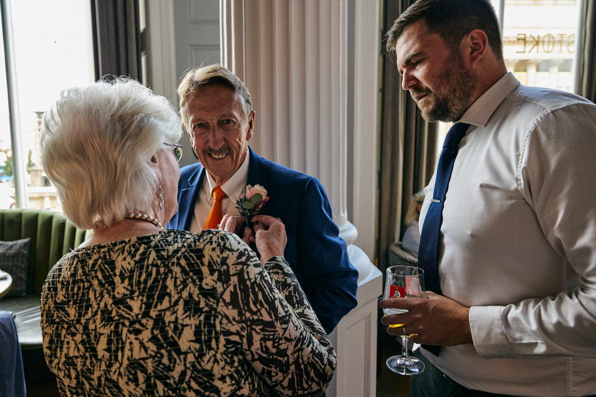 guests have fun trying to figure out how to do a button hole