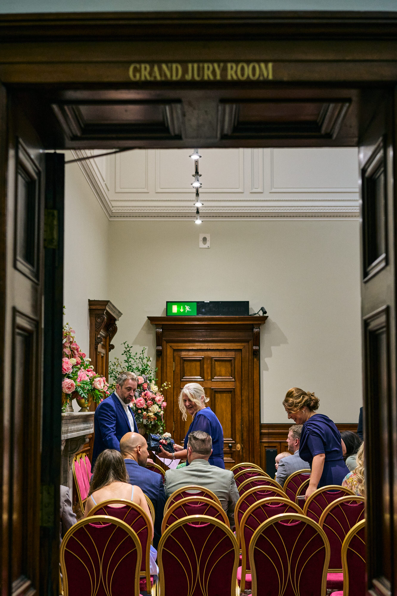Guests begin to be seated in the Jury Room at St Georges Hall in Liverpool