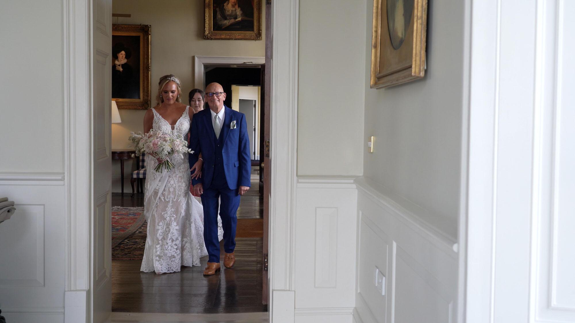 a bride waits to walk down the aisle at Stubton Hall Nottinghamshire