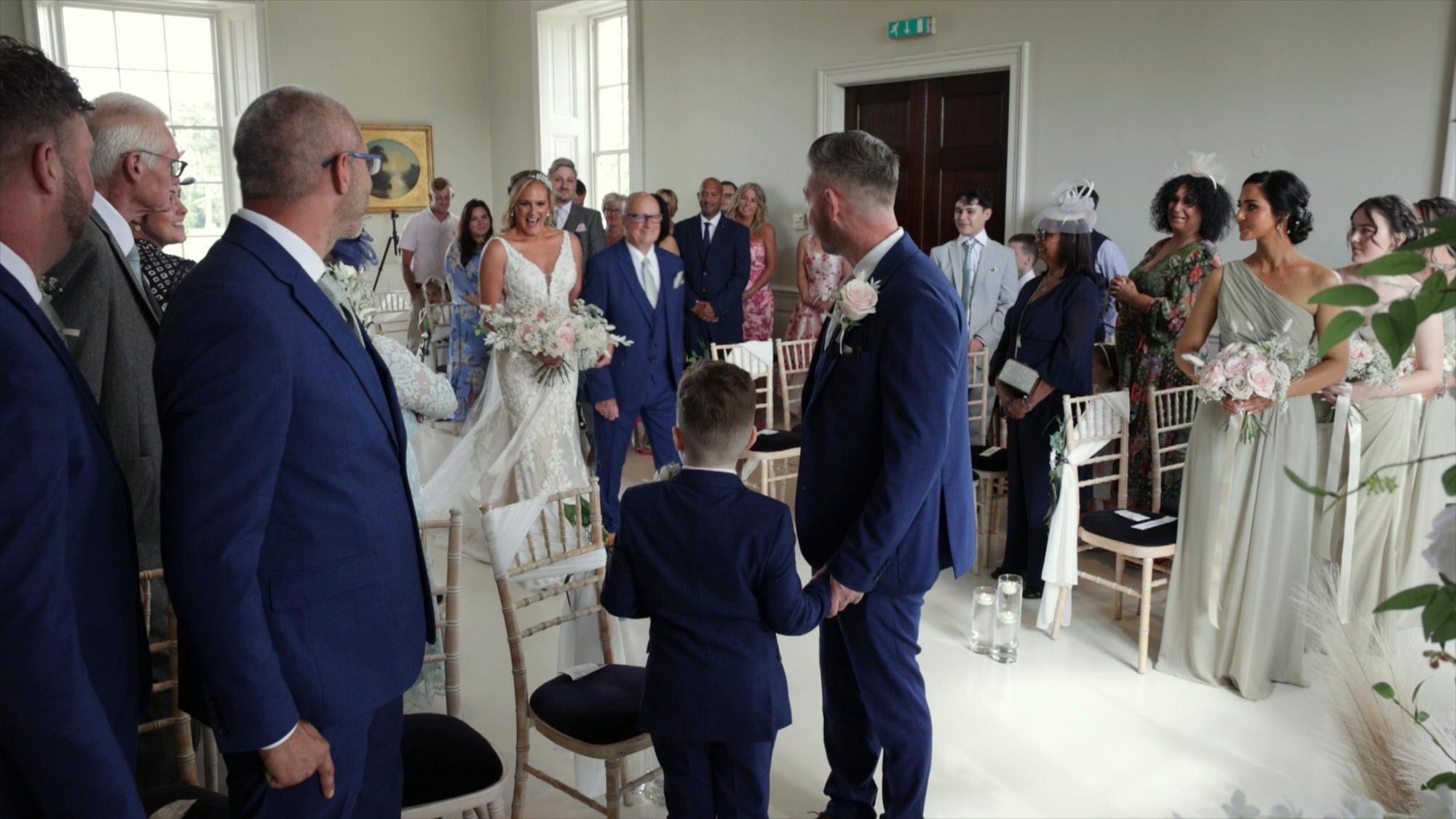 A groom waits nervously at the aisle at Stubton Hall Newark