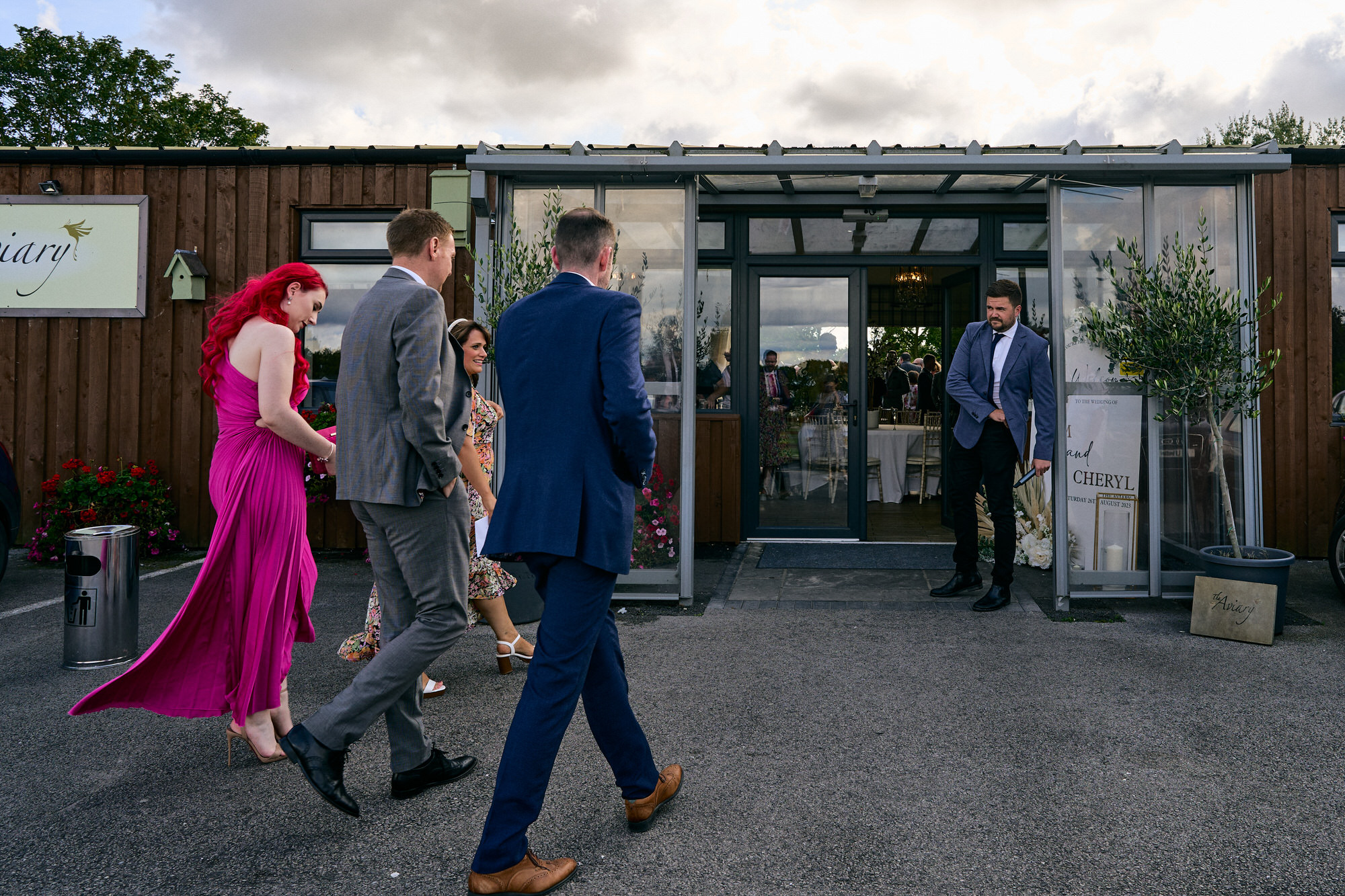 wedding guests walking up to The Aviary Ormskirk
