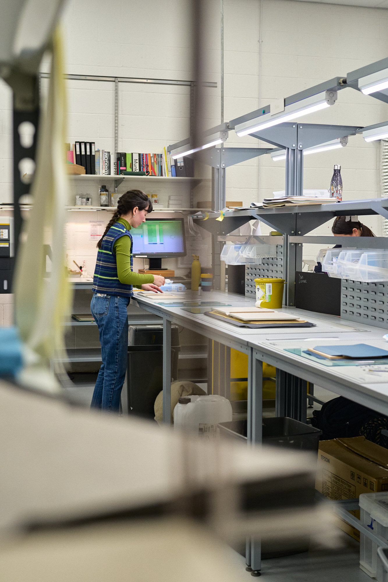 a documentary photo of someone working within the folio photography workshop in Yorkshire