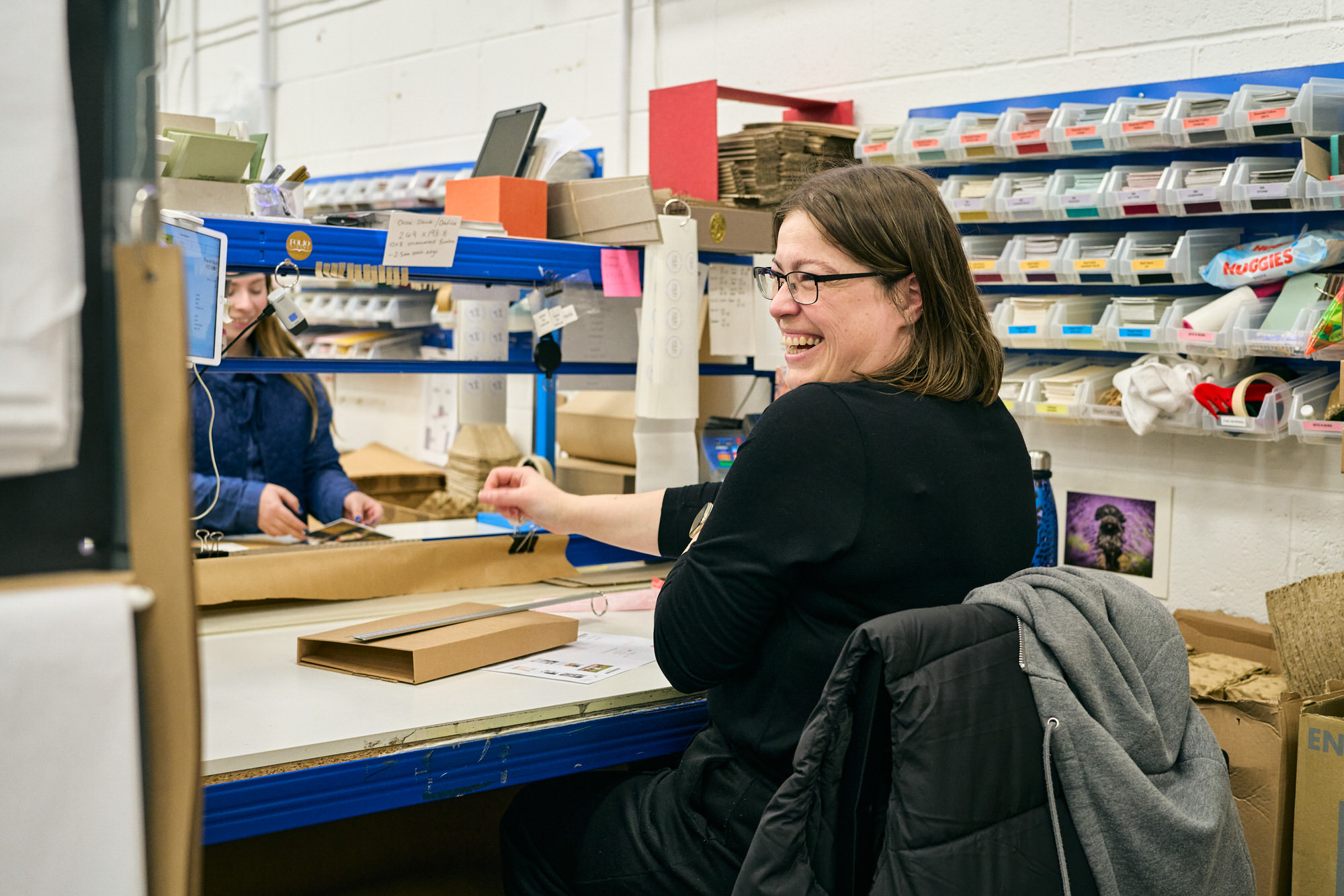 someone working at folio laughs during a workshop tour