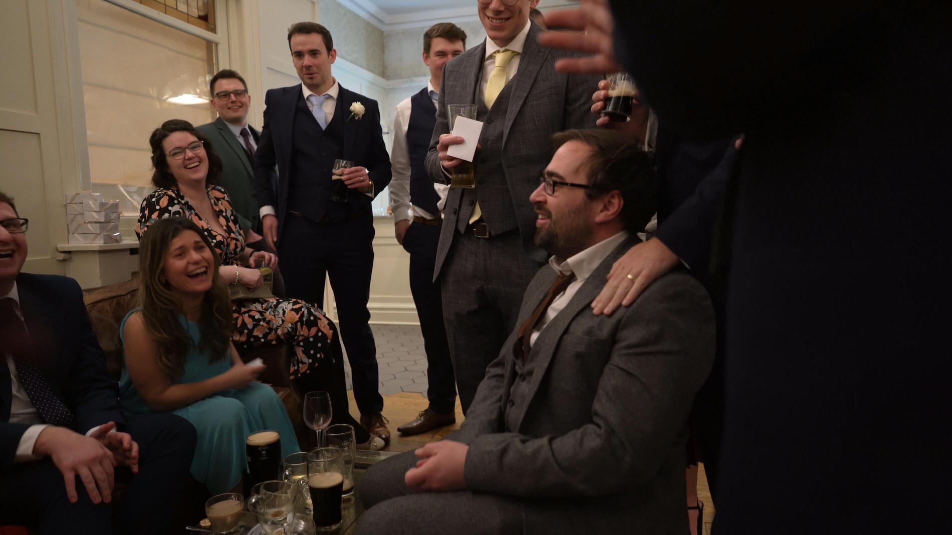 guests laugh and look cofused by Zanda magic at Ashfield House Standish