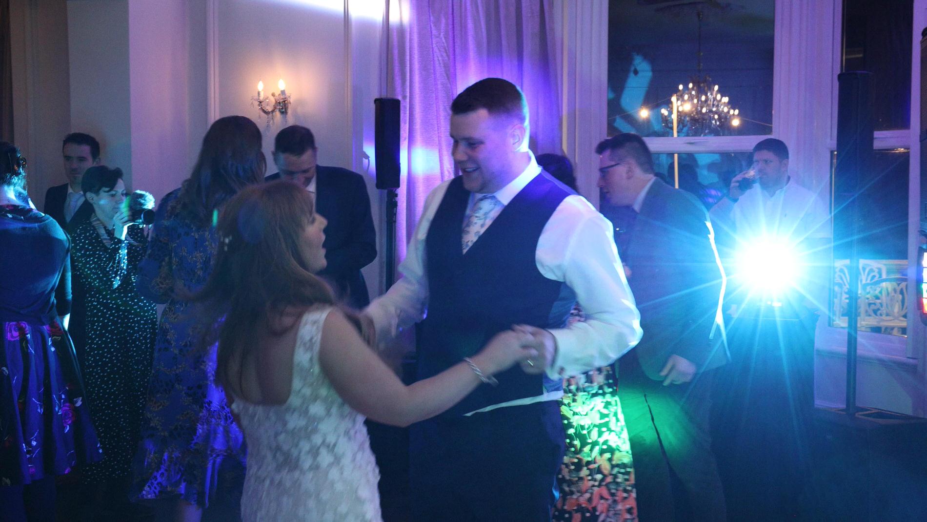 guests join the couple on the dancefloor at Ashfield House Standish