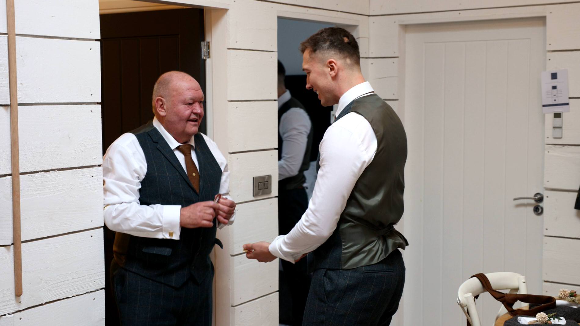 a groom gets ready with his grandad at Bashall