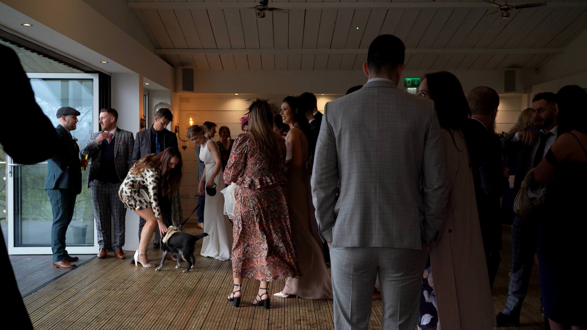 a wide video shot of guests enjoying the drinks reception at Bashall