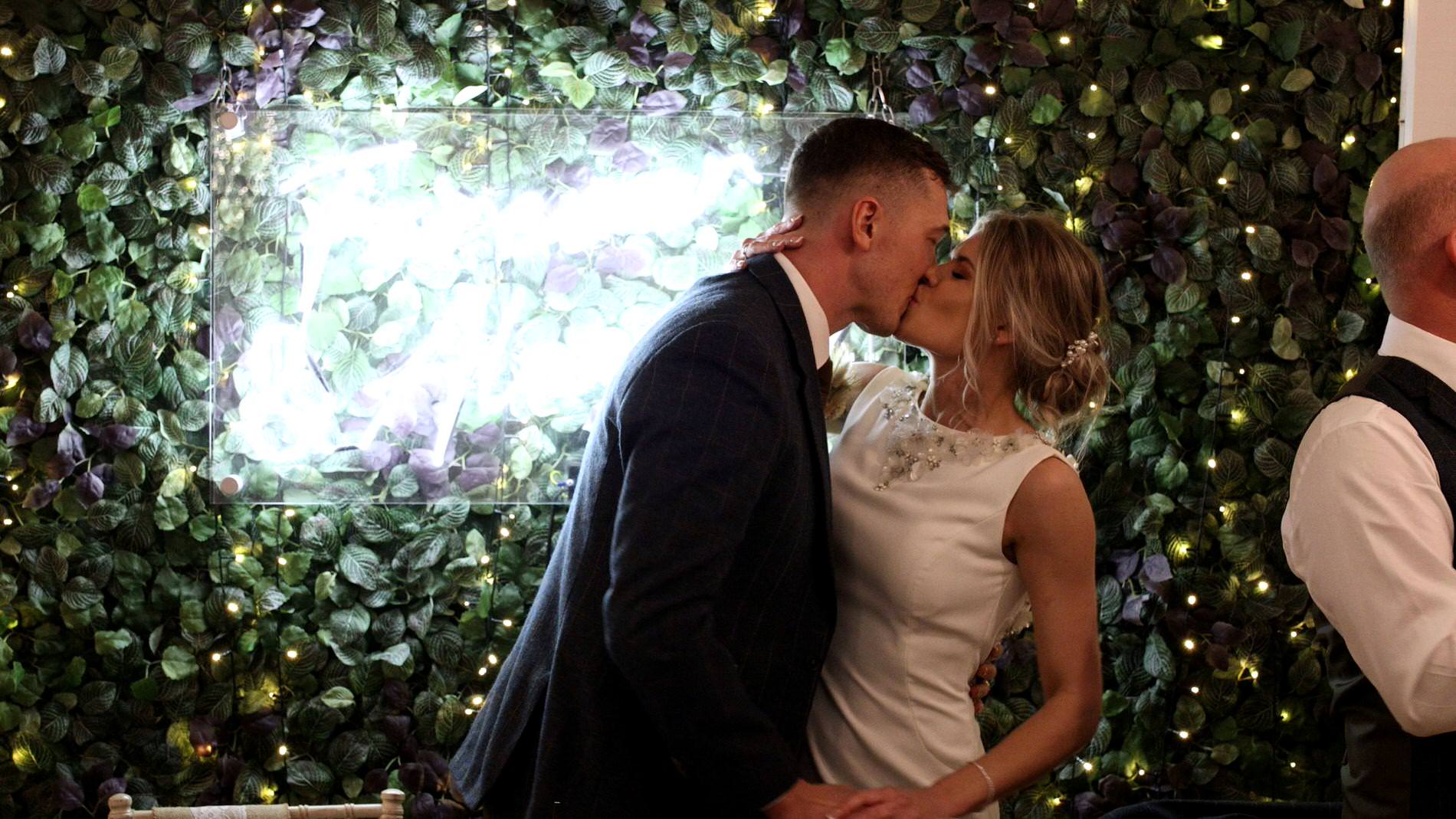 the couple have a kiss after her surprise