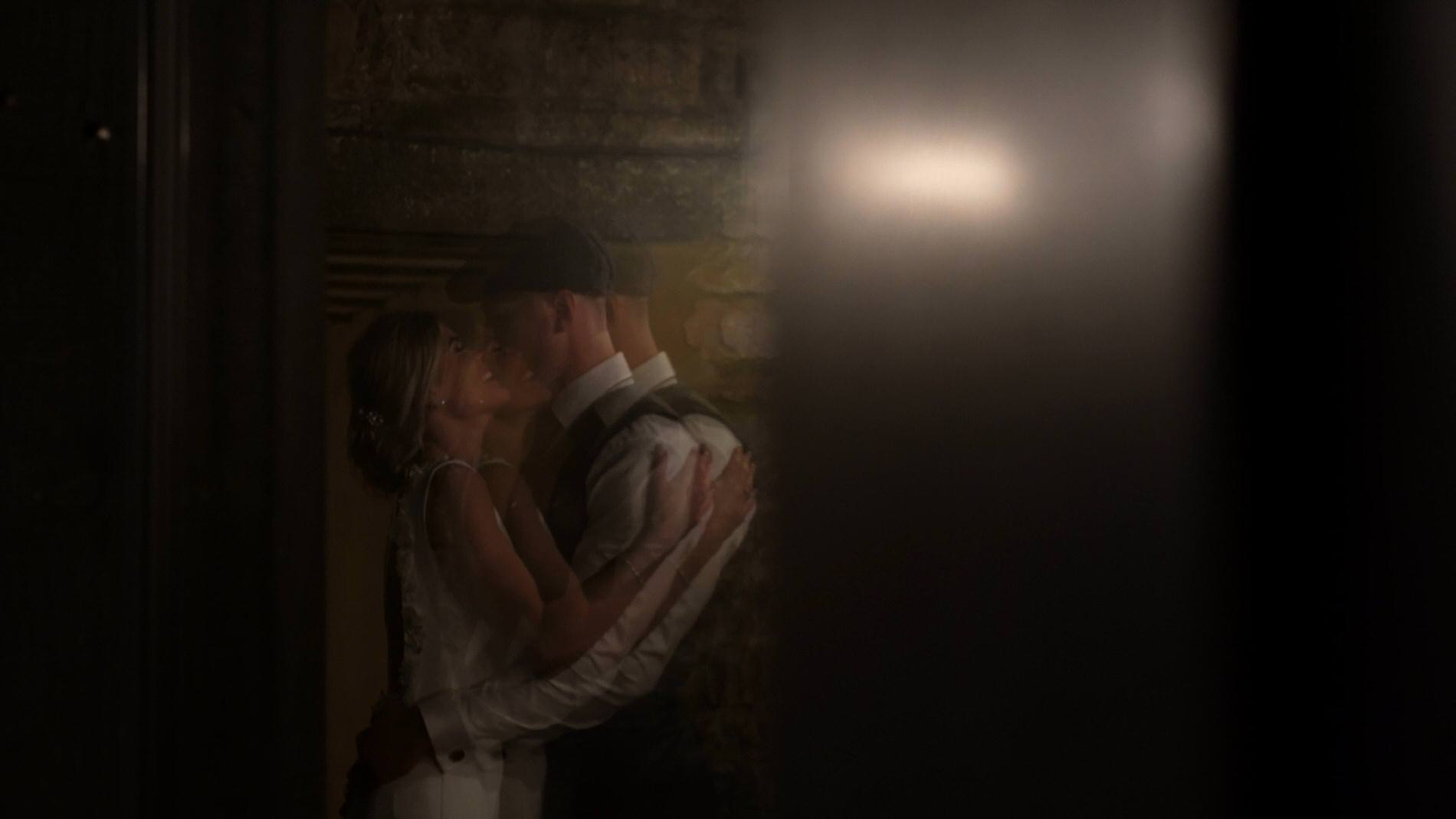 a unique reflection video shot of the couple at Bashall barn