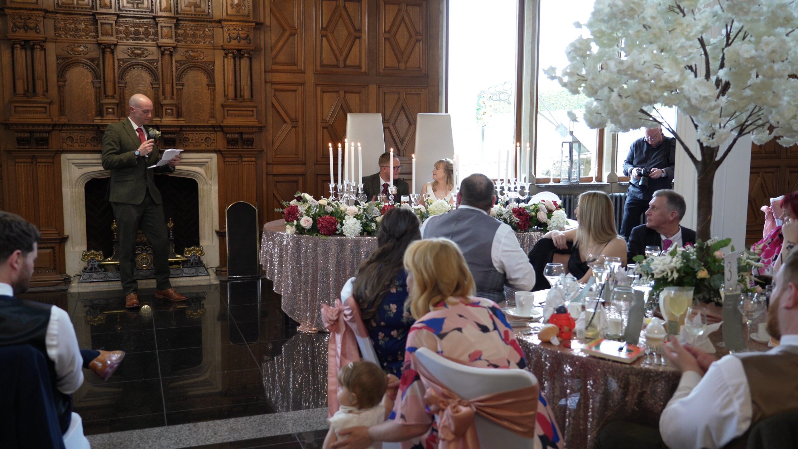 the best man makes the room laugh during his wedding speech