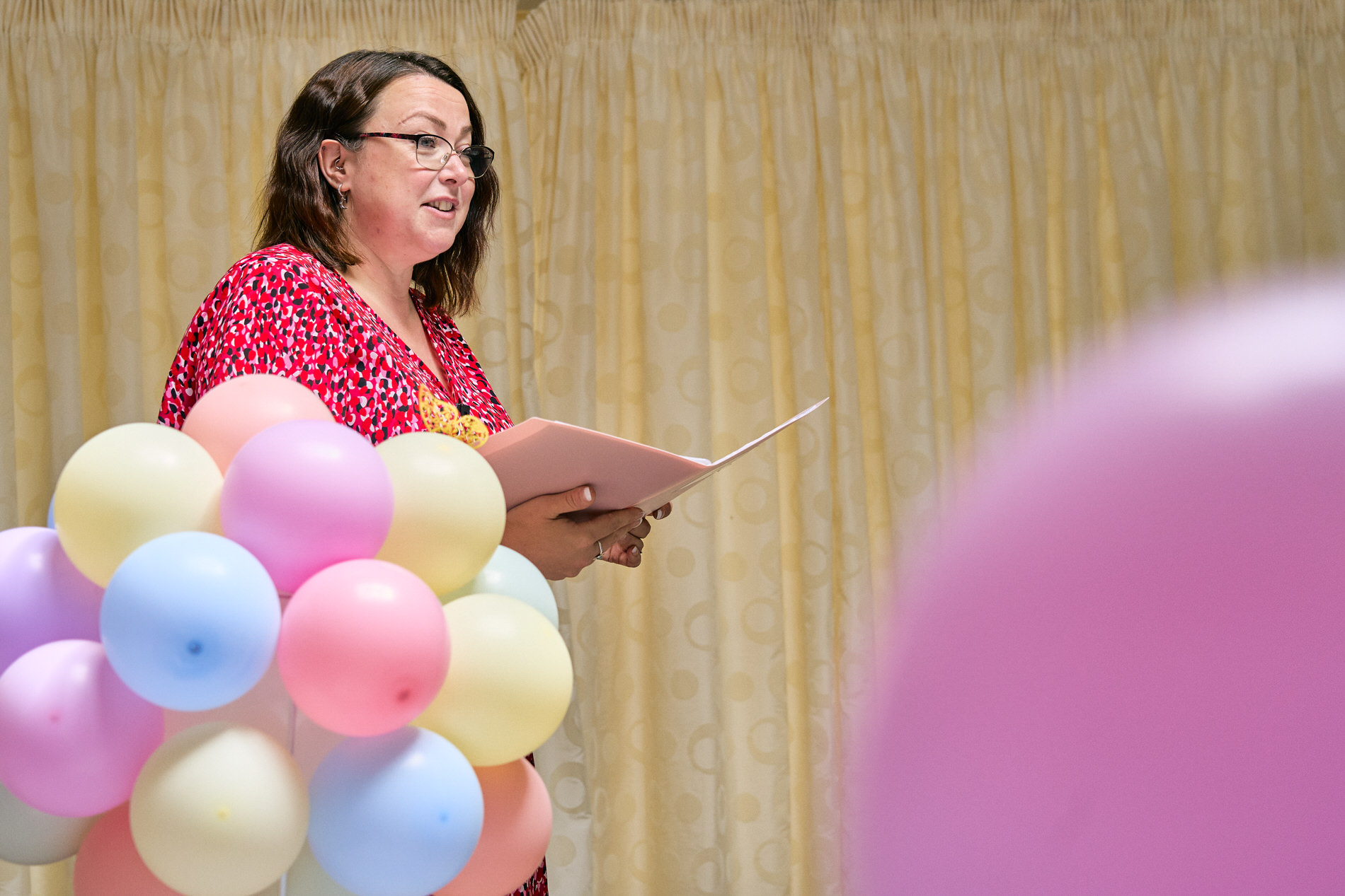 Selina at Ceremonies by Sel reading personal words during a naming day at Holland Hall