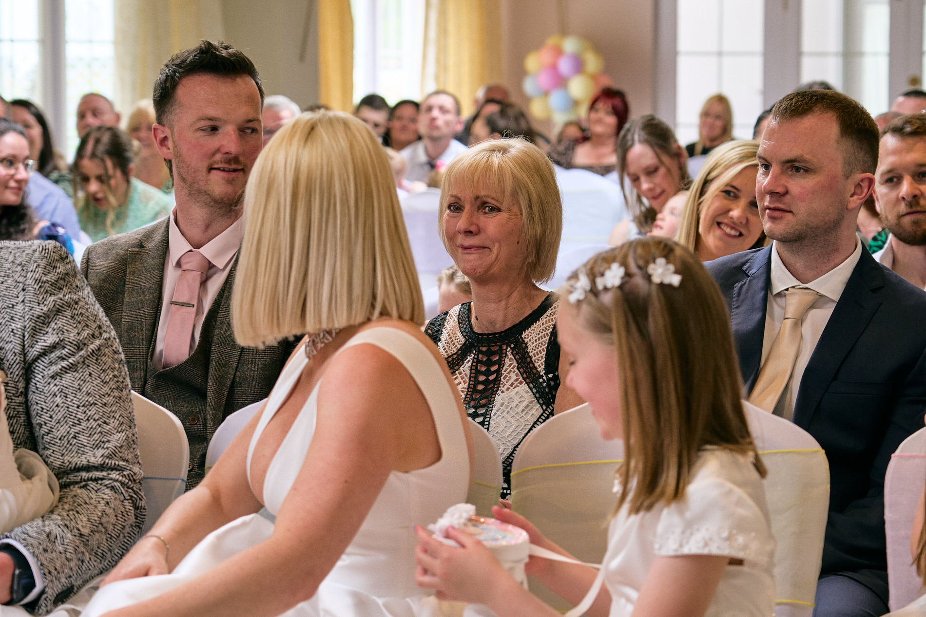 a grandparent gets emotional being thanked during naming day ceremony