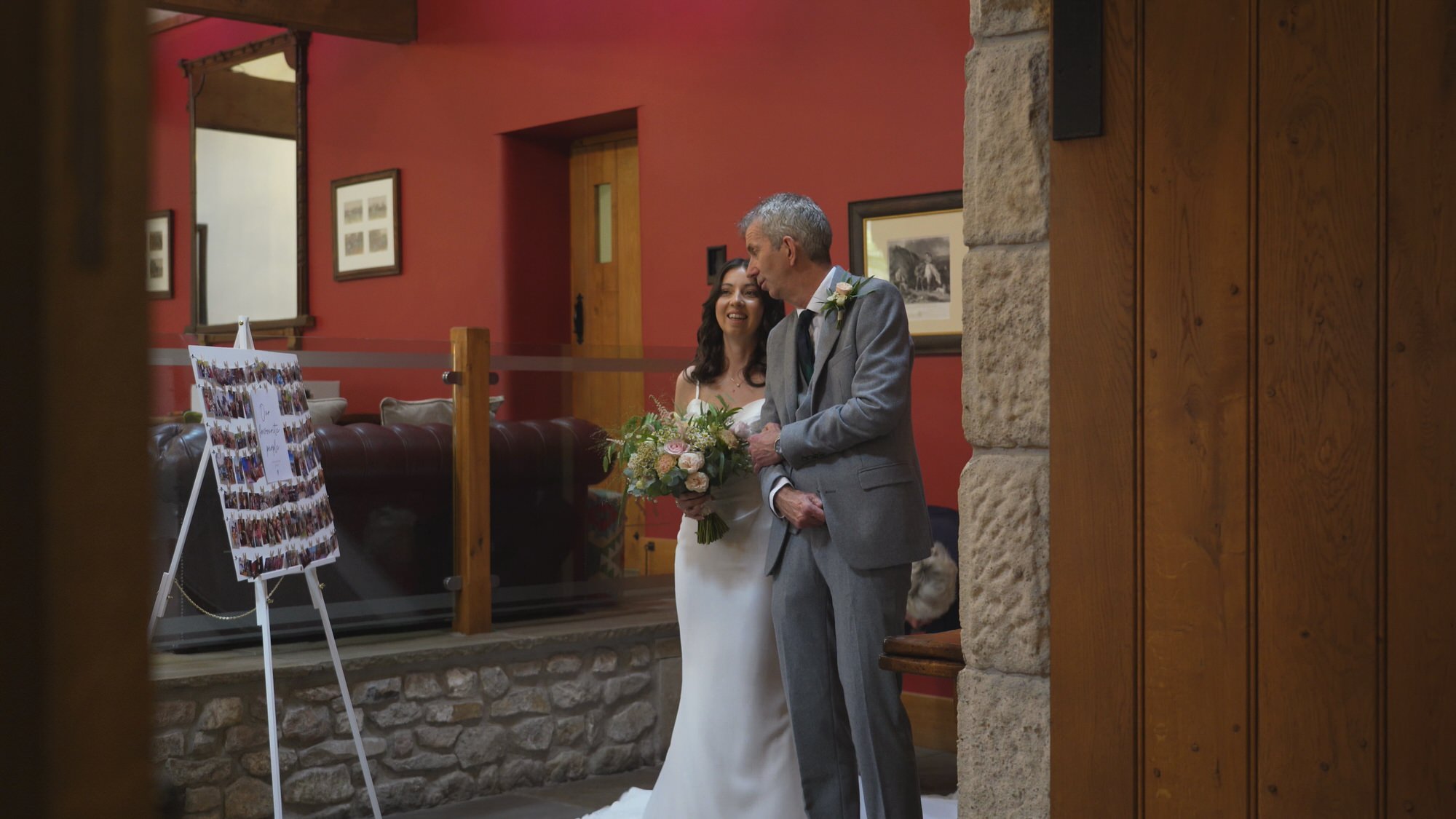 candid moment caught on video of a bride and her dad before they walk down the aisle