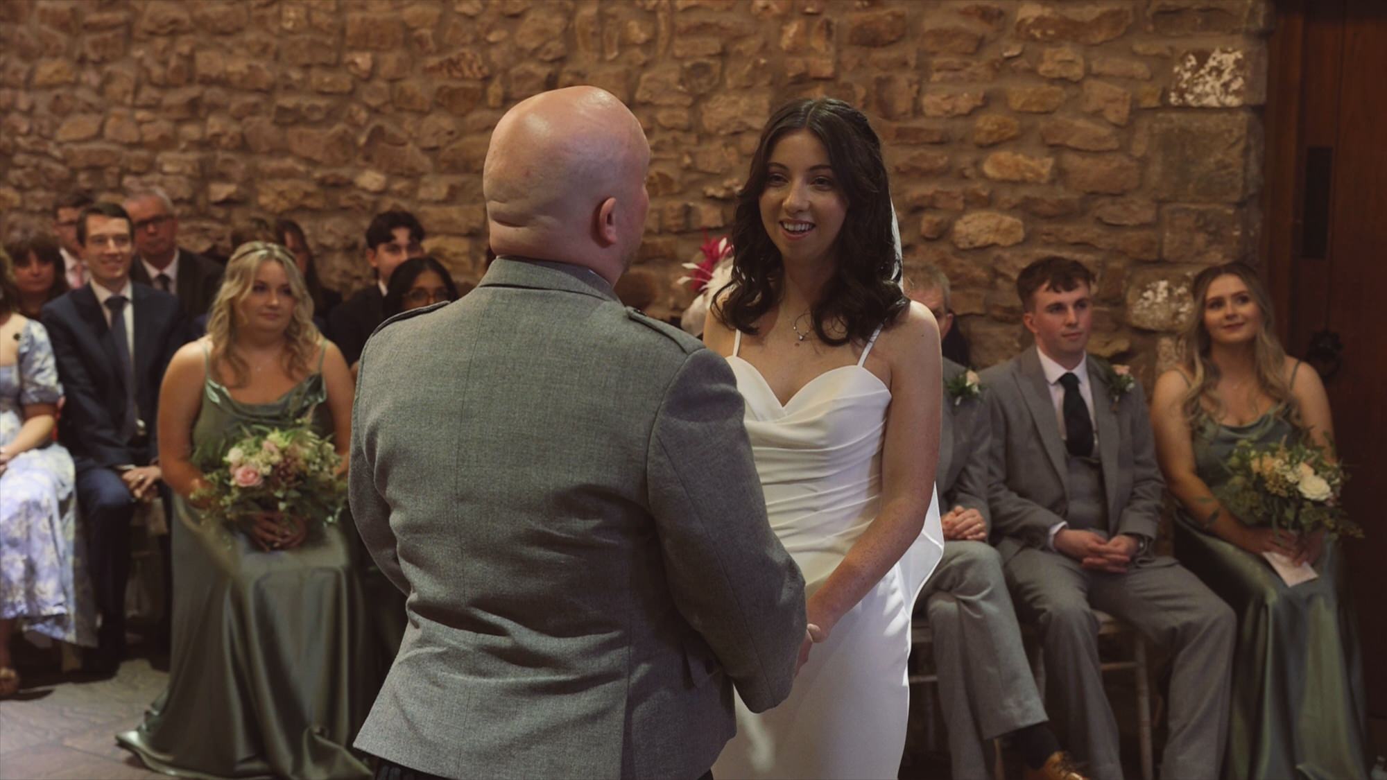 a couple say their wedding vows at Browsholme Hall Lancashire