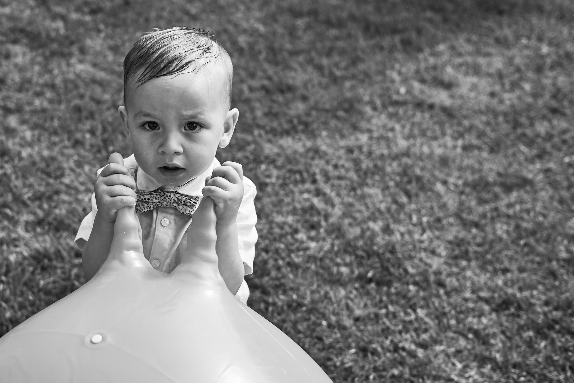 close up of a kid with a space hopper