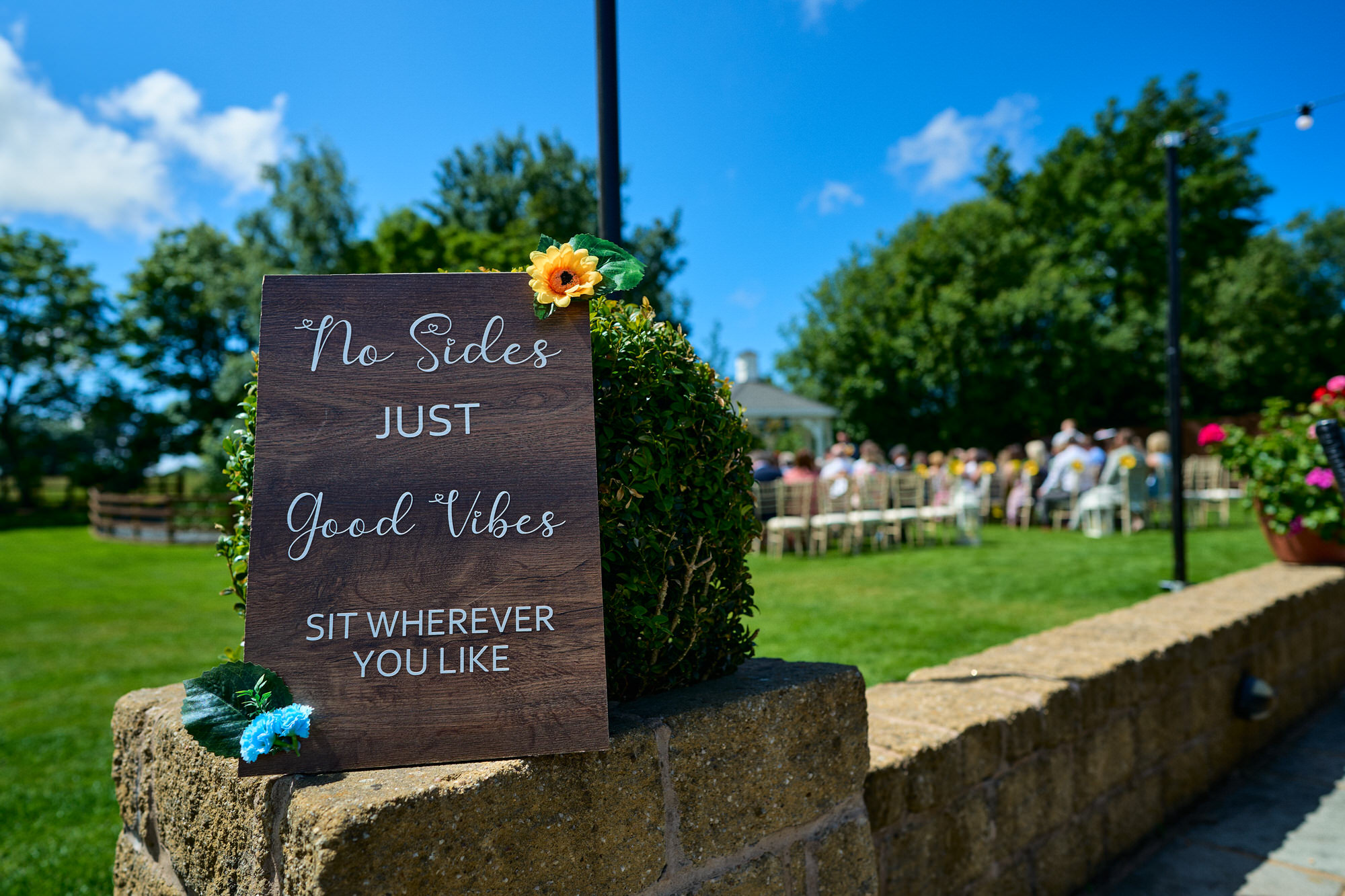 a handmade wood sign for a wedding ceremony at The Aviary Ormskirk