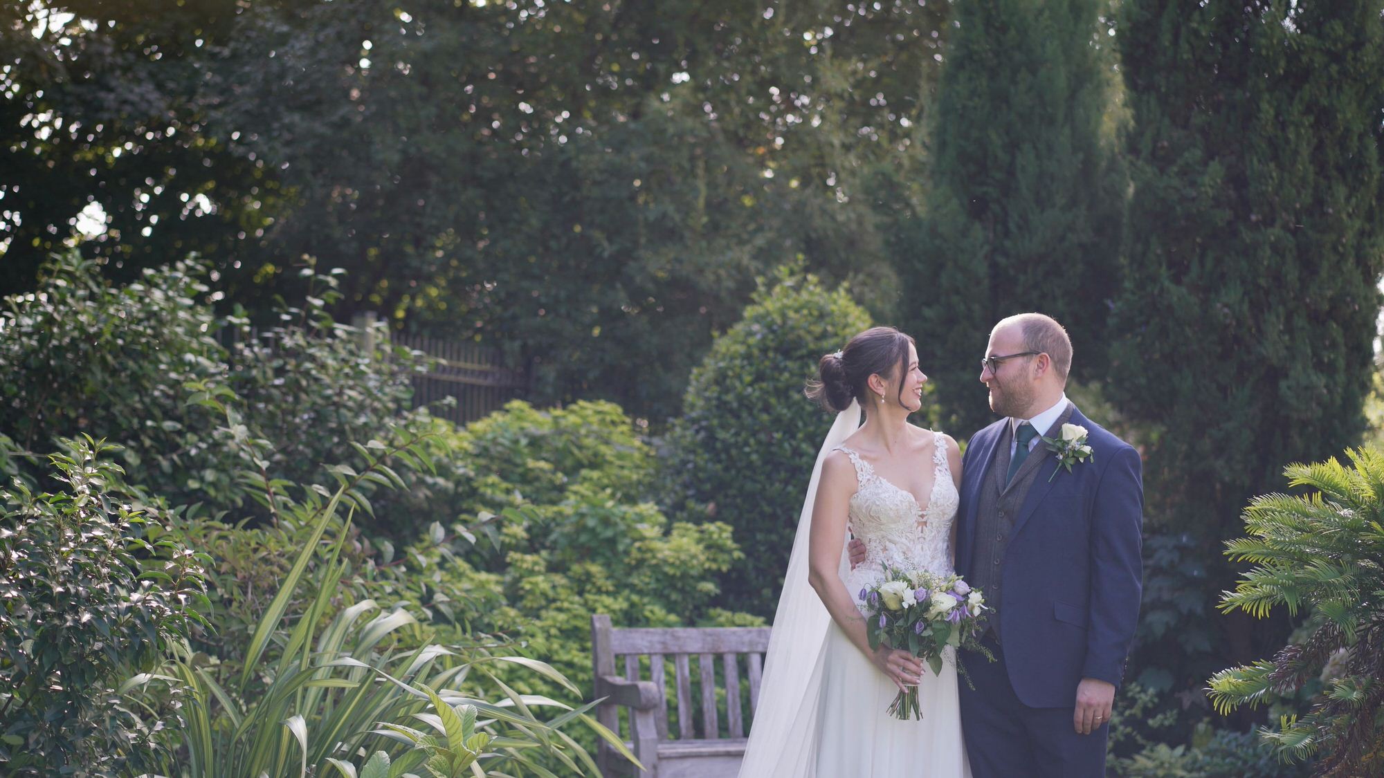 a couple pose for natural photos outside Sefton Palm House Liverpool