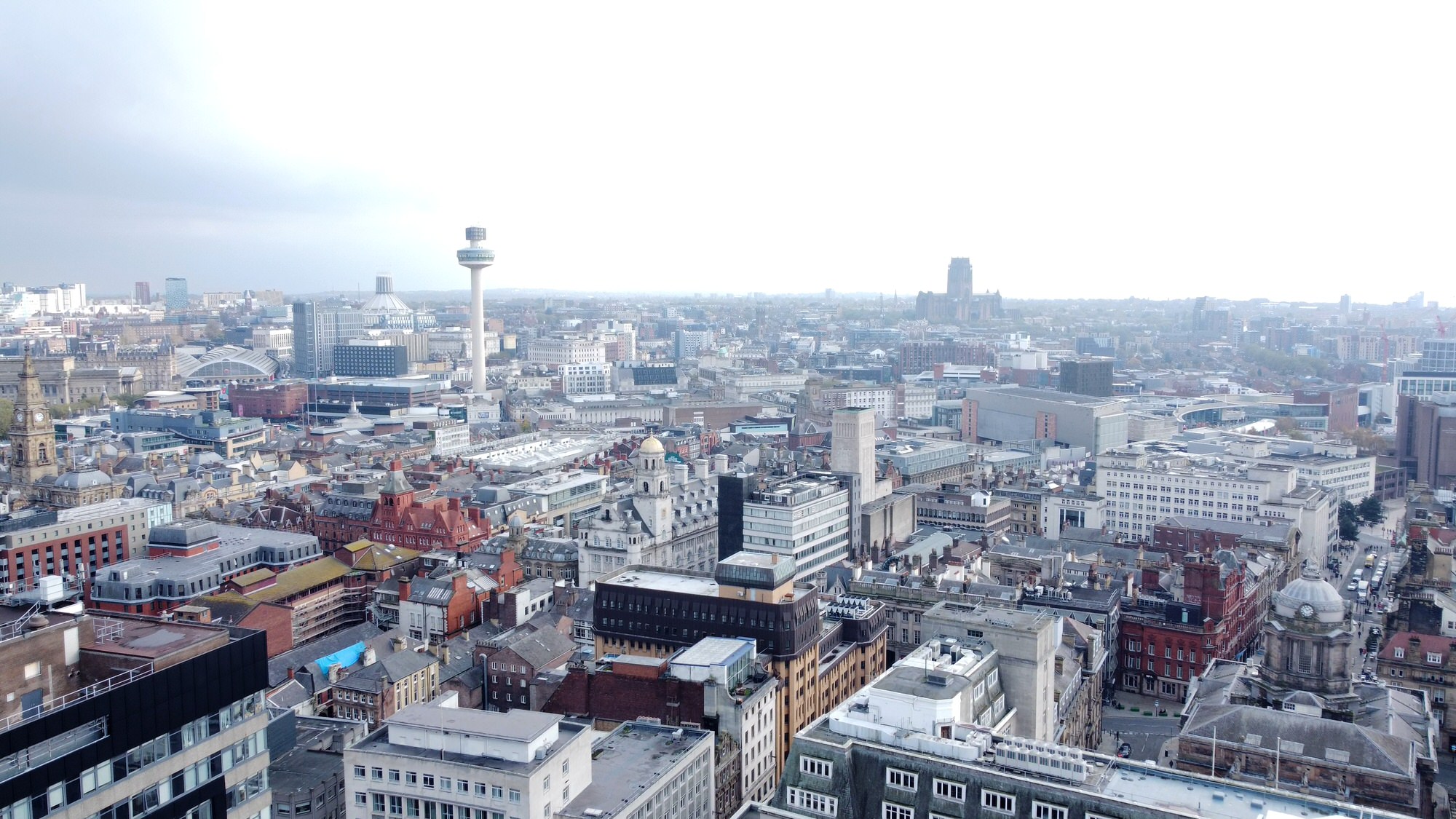 aerial drone video still of Liverpool skyline before wedding