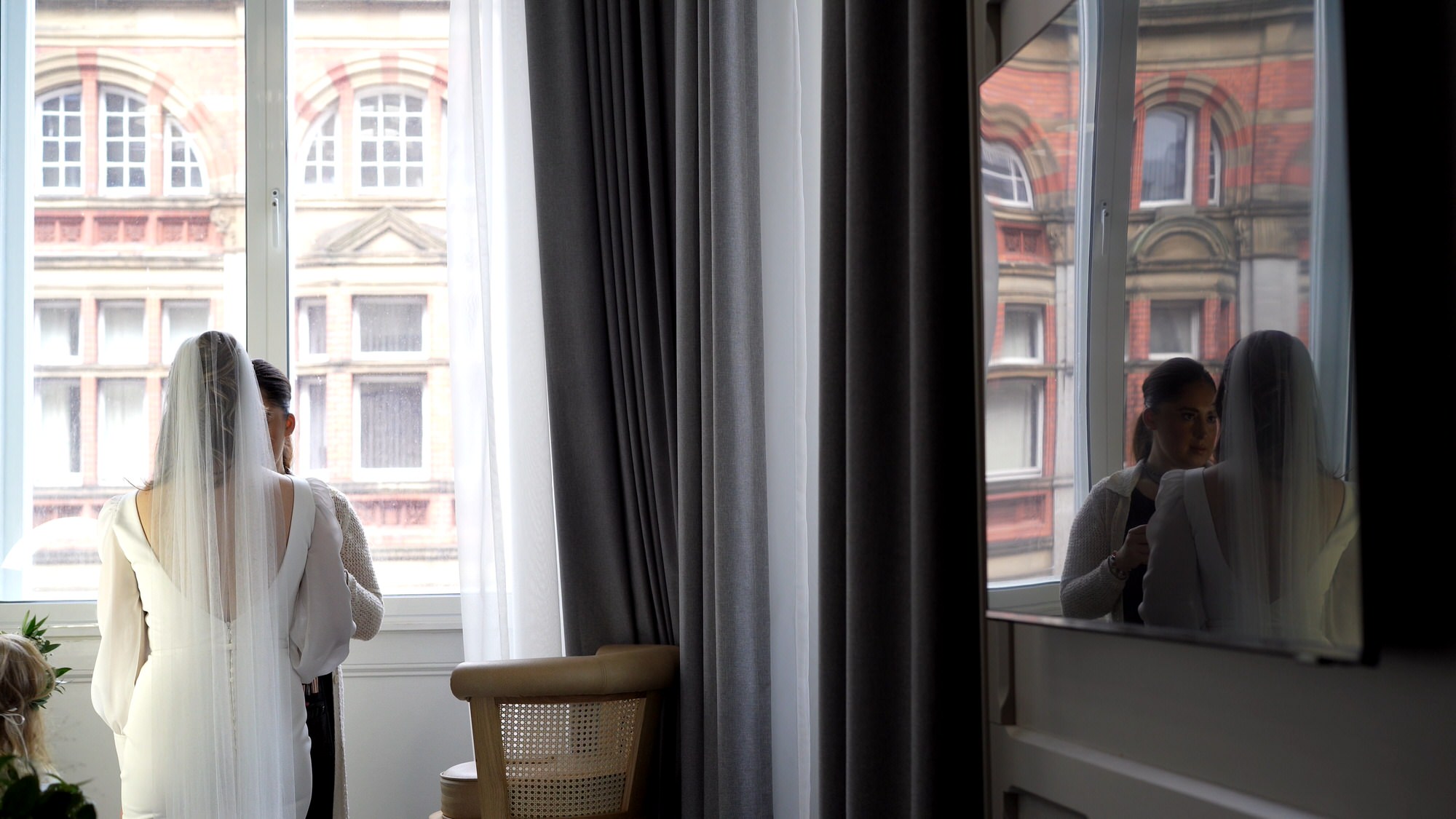 a cinematic video still of a bride and her reflection at the Municipal Hotel
