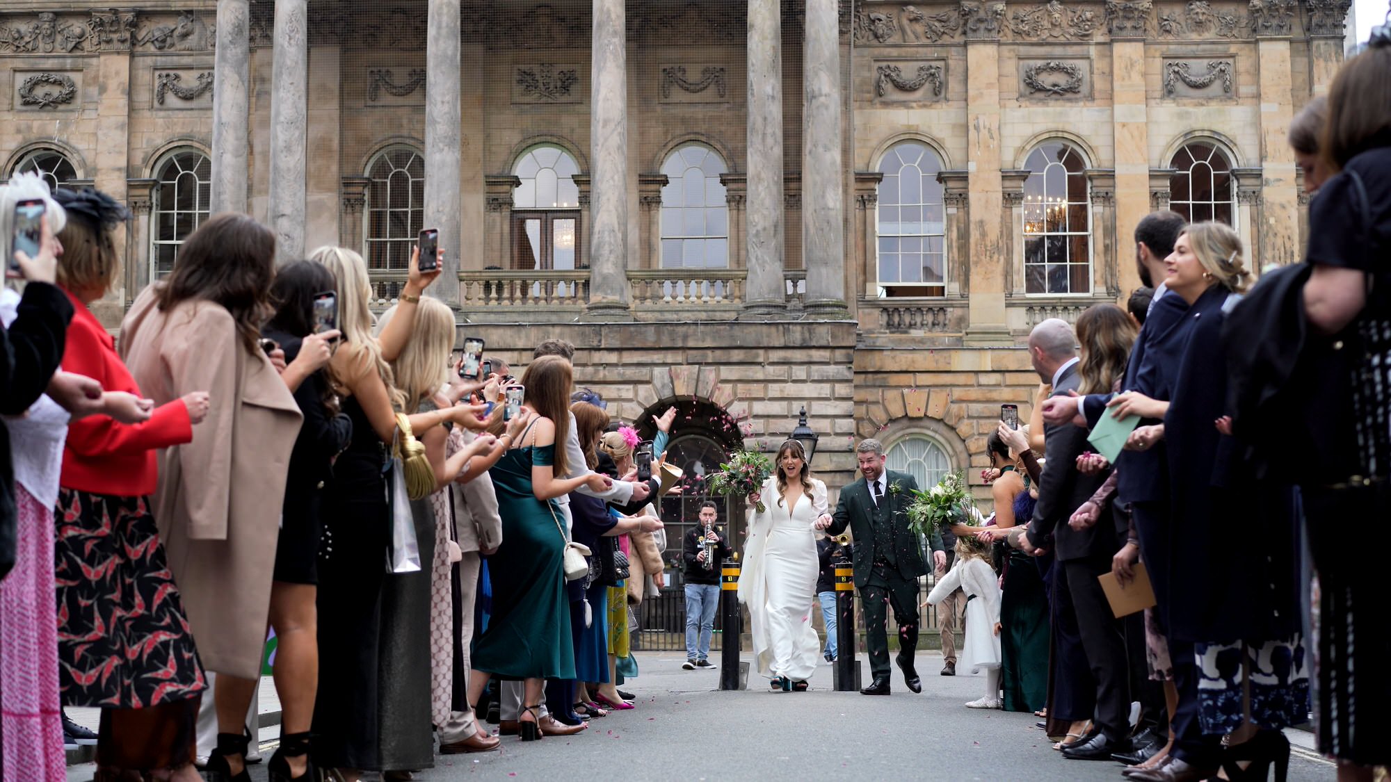 wedding confetti down Castle street after Town Hall wedding