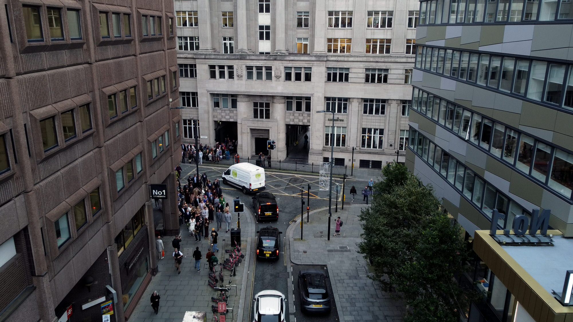 drone video still of a walking band leading a wedding to One Fine Day Liverpool