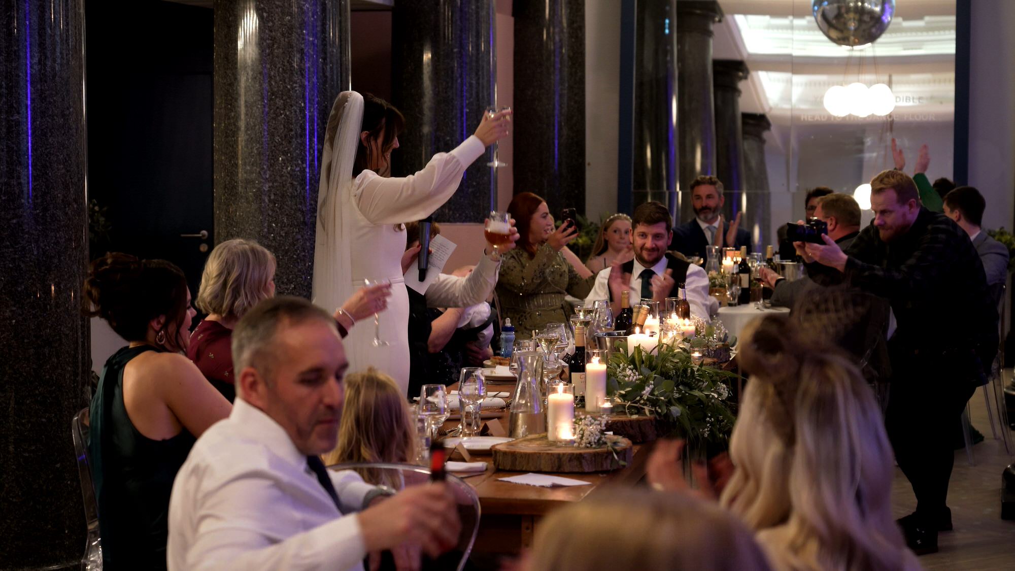 bride makes a toast during wedding breakfast at One Fine Day