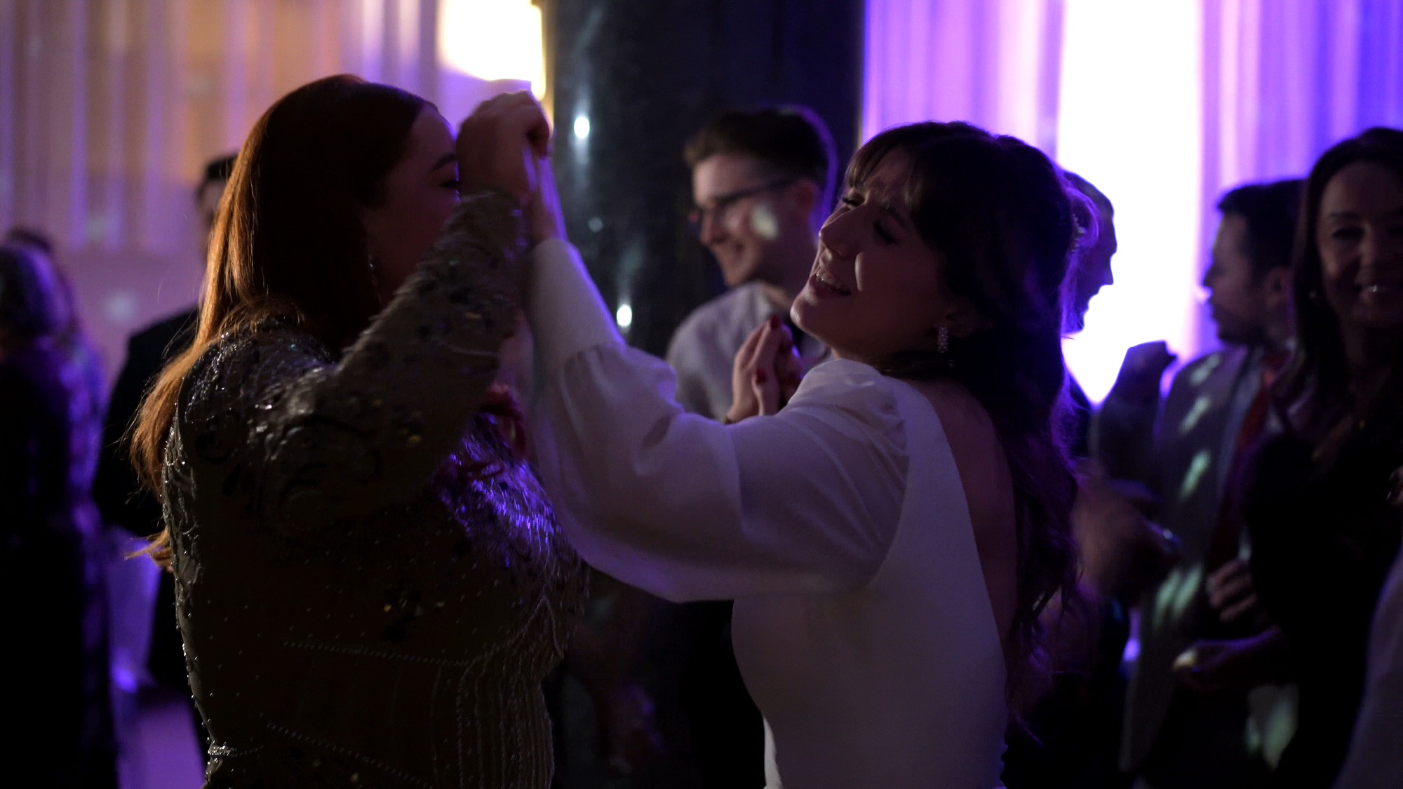 candid video stills of guests dancing during One Fine Day reception