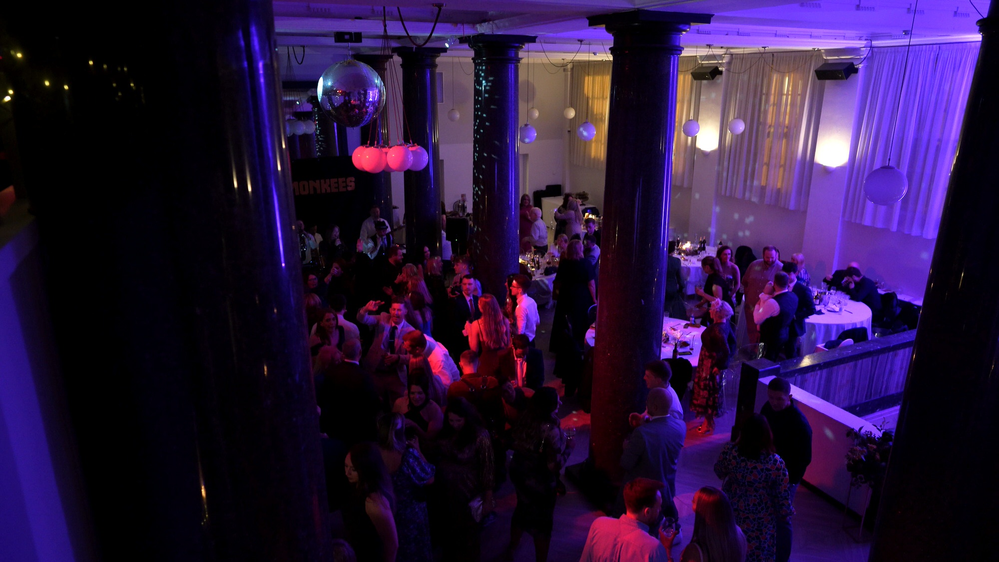 a wide video shot of the evening reception at One Fine Day