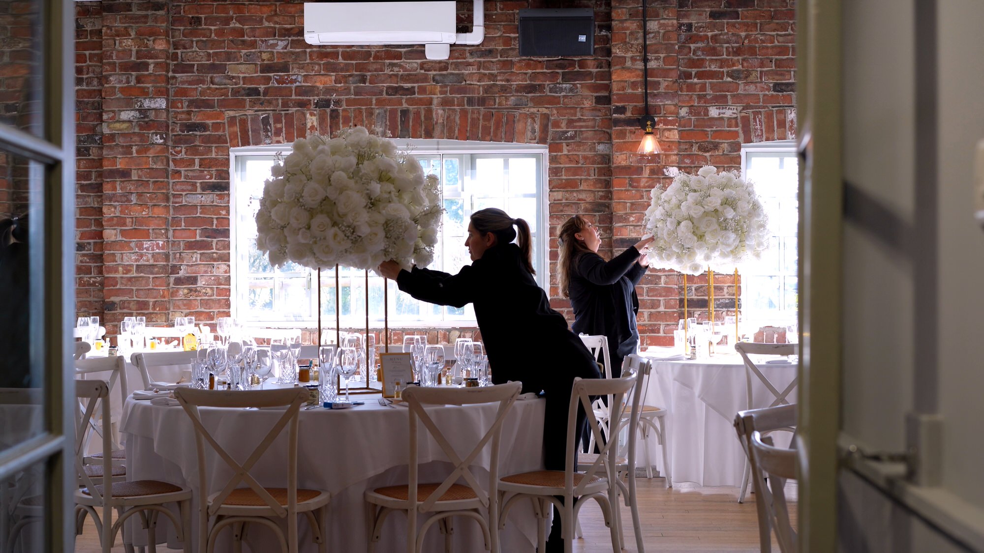 video still of venue dressers at Larkspur Lodge