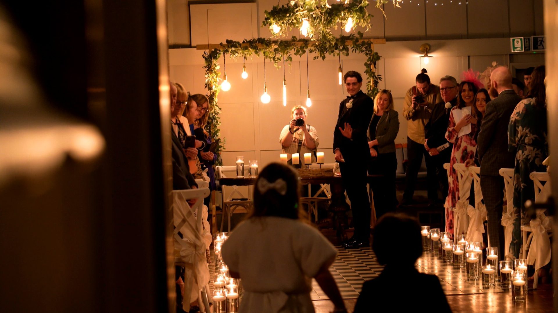 a candlelit ceremony room at Larkspur Lodge in Knutsford Cheshire