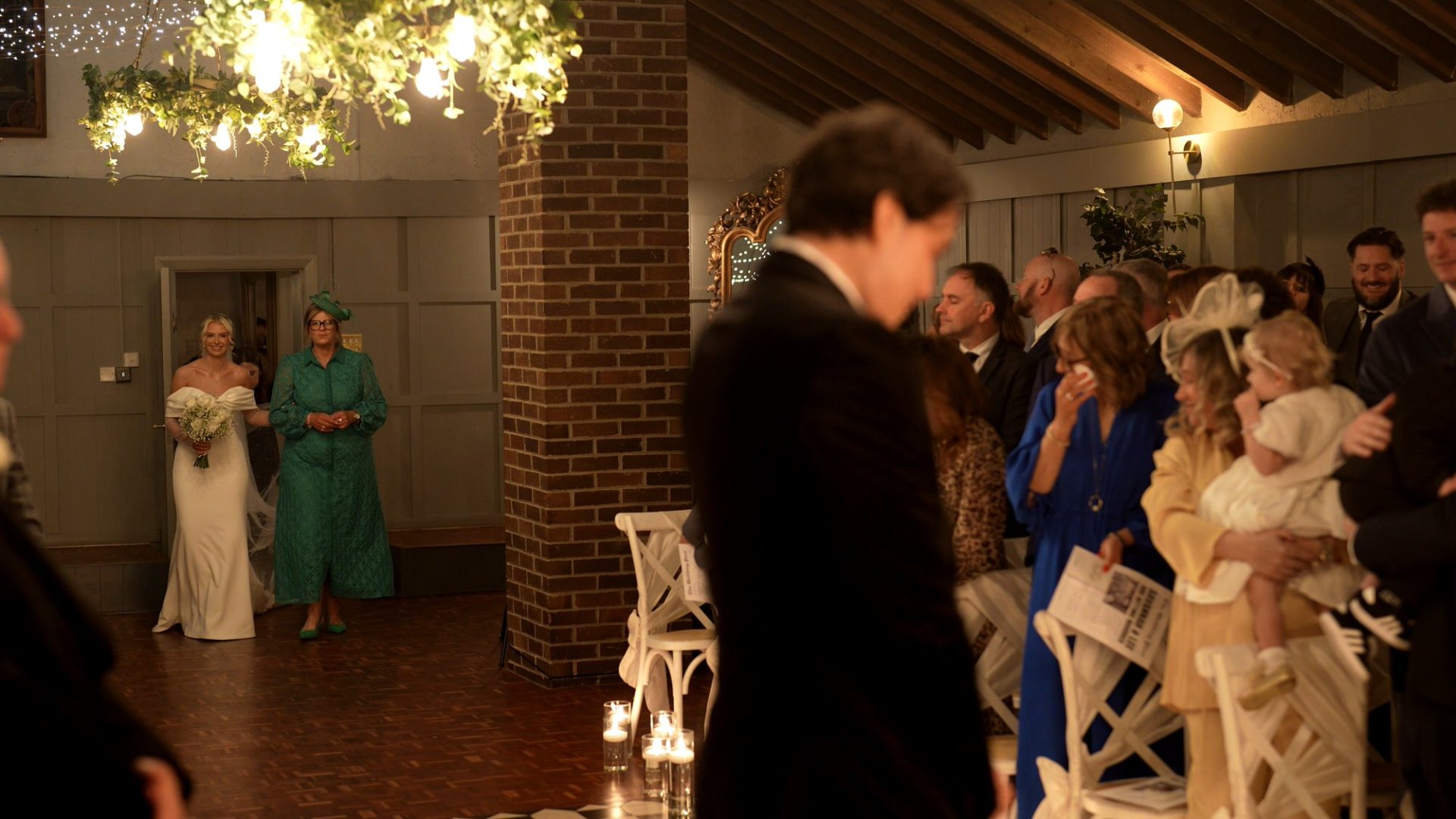 an emotional groom as the bride walks down the aisle Larkspur Lodge in Cheshire