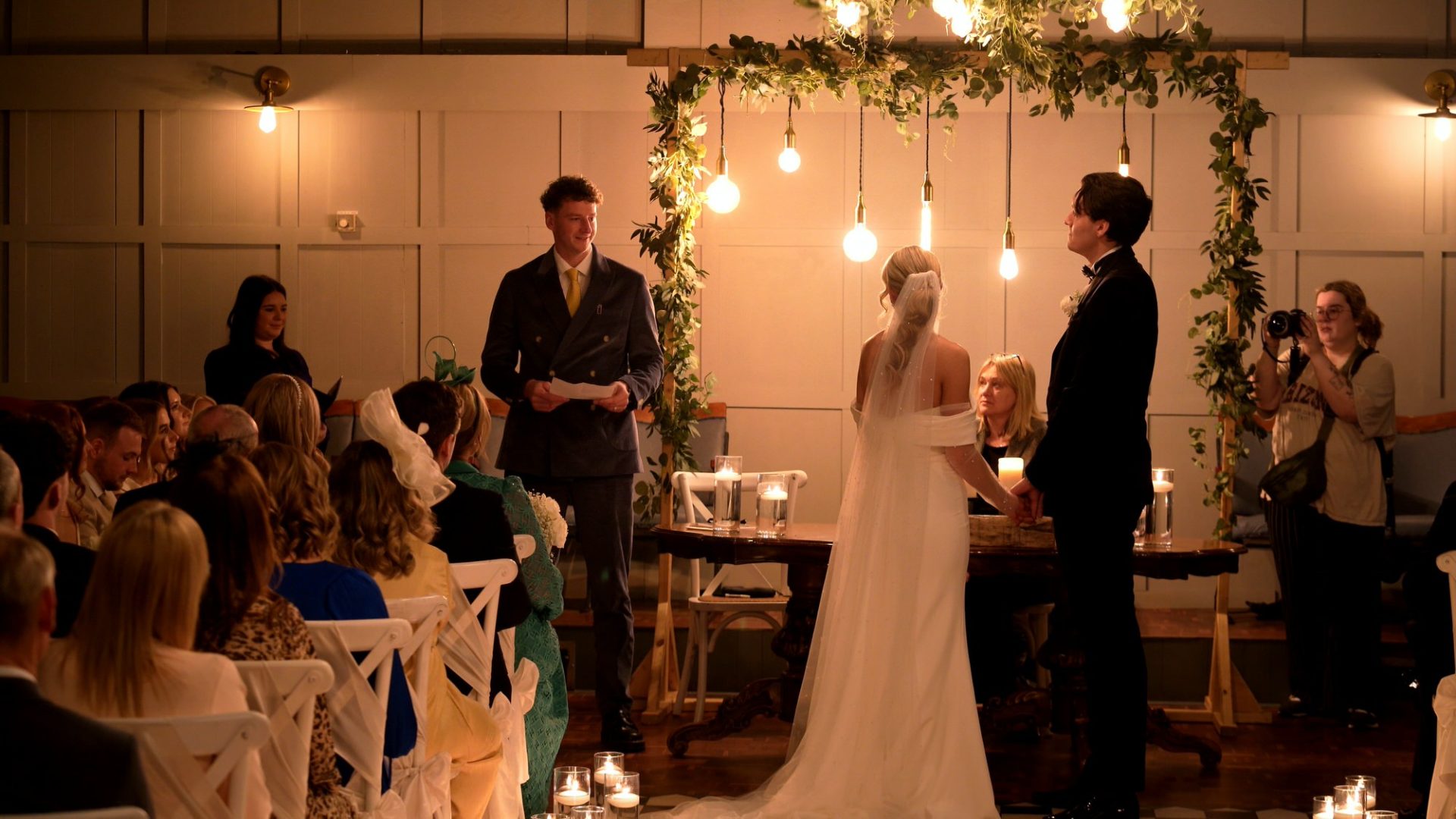 a guest does a reading during a ceremony at Larkspur Lodge in Cheshire