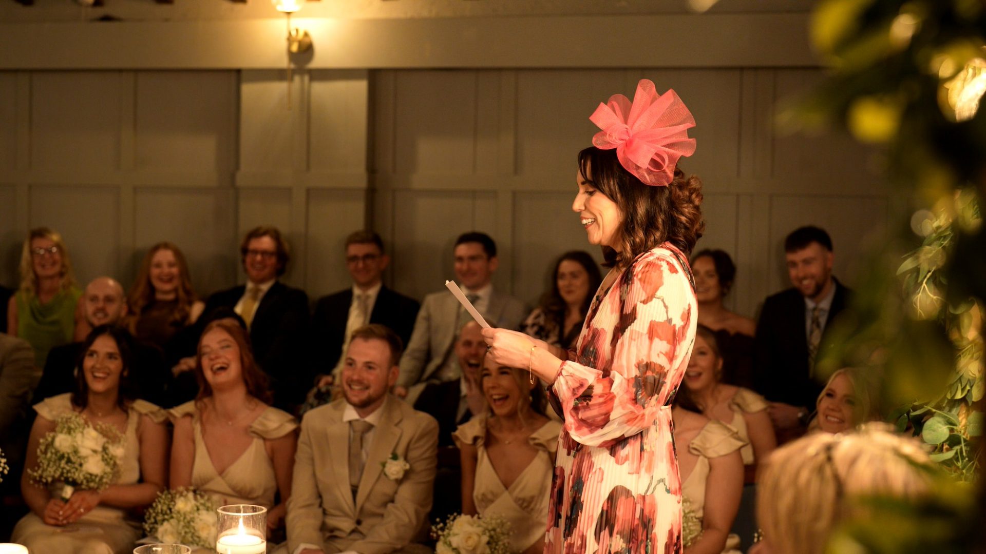guests laugh during a reading at Larkspur Lodge in Cheshire