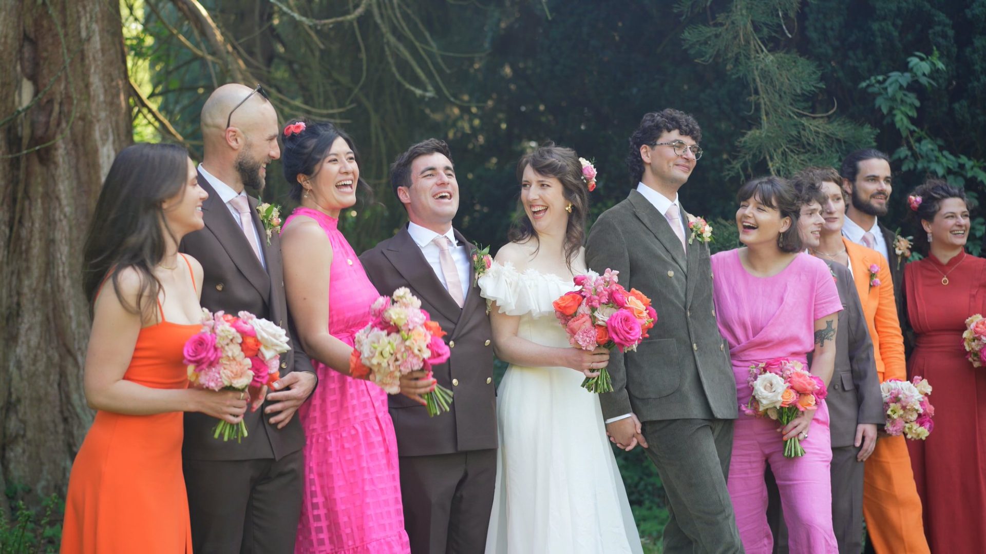 the bridal party have fun during the formal photos