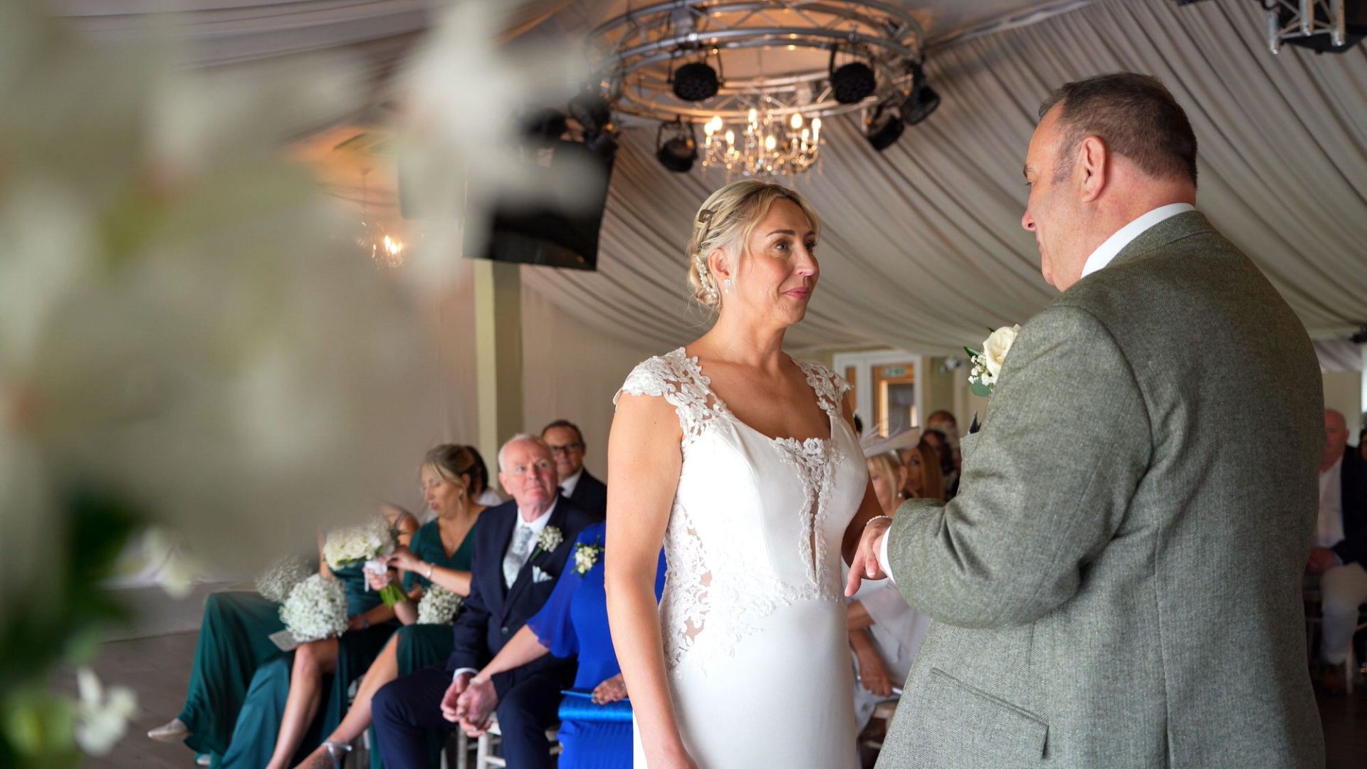 a couple exchange rings during a ceremony at The Moorlands Inn Halifax