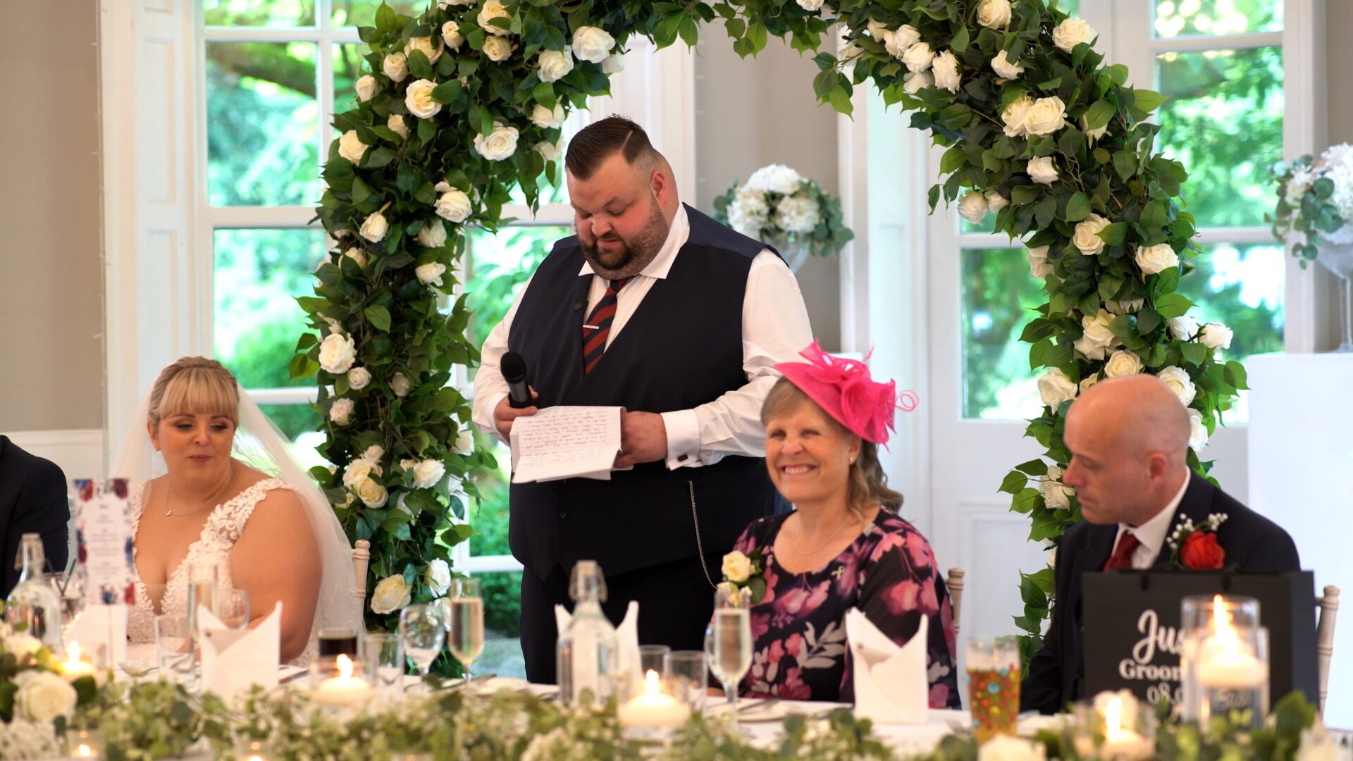 the top table laugh during the grooms speech at Statham Lodge Hotel