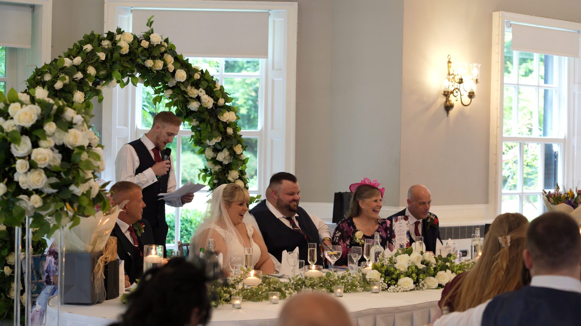 best man makes people laugh during speech