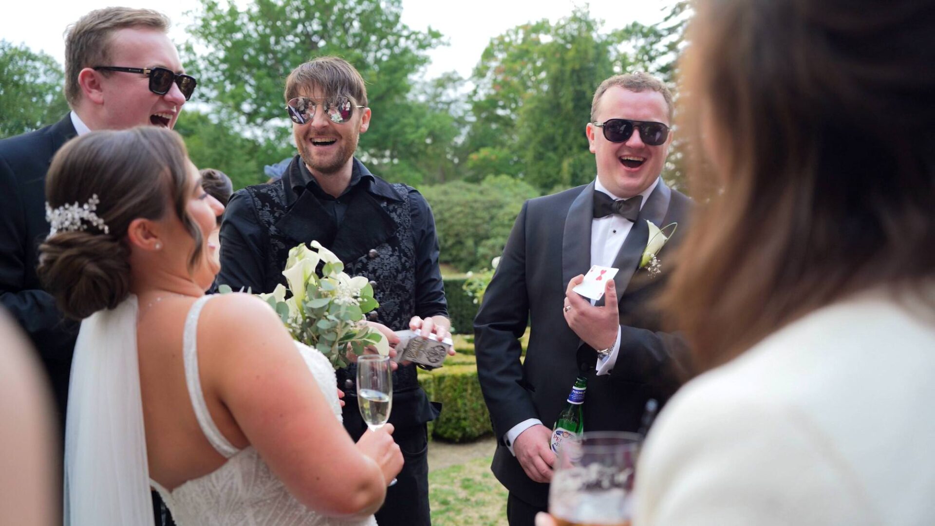 the couple are wowed by a magic trick at Rudding Park Harrogate